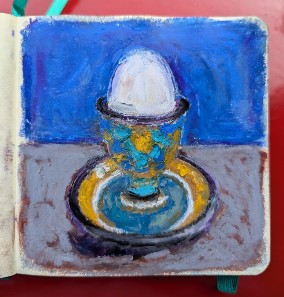 Vlada Darenenkova tekening ei eierdop gouds plateel 2025 vetkrjt op papier sketsboekje Drawing egg Gouda pottery egg cup 2025 oil pastel on paper, sketchbook